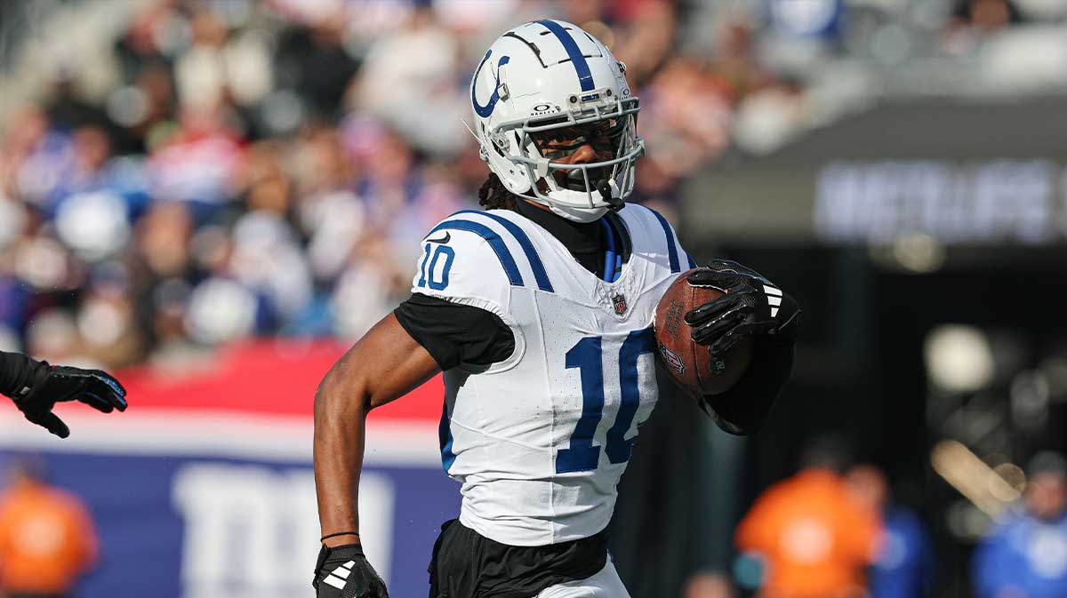 Indianapolis Colts wide receiver Adonai Mitchell (10) gains yards after catch during the first half against the New York Giants