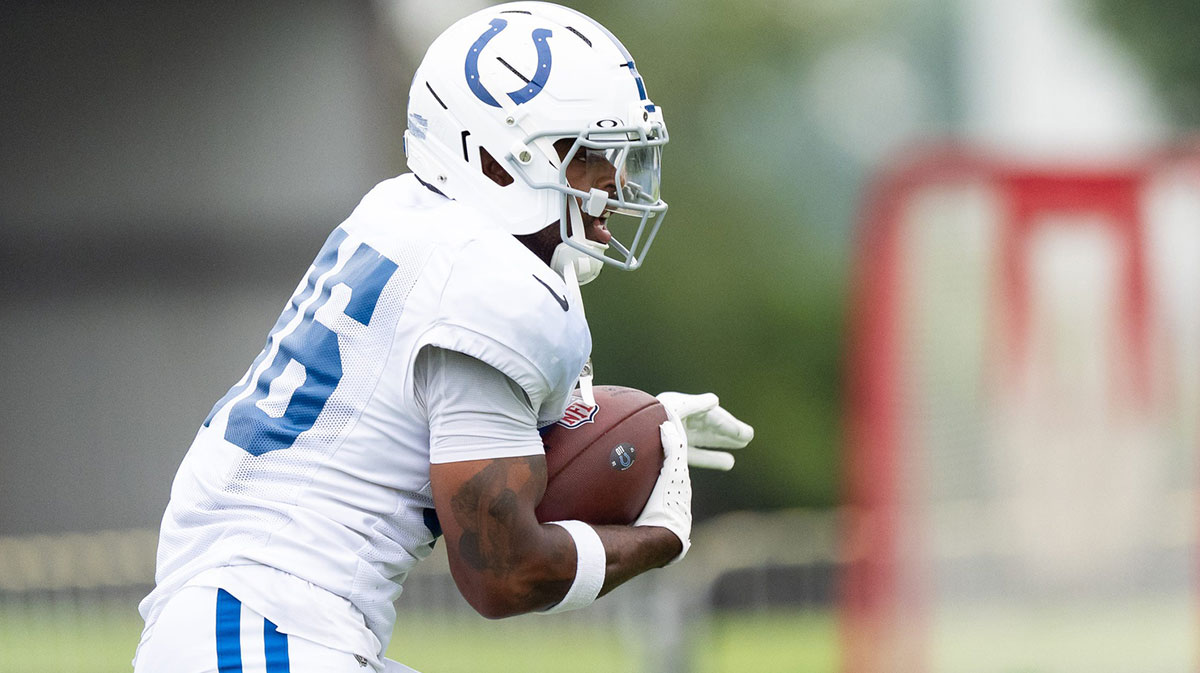 Newly-signed Colts RB carted off after hip-drop tackle from teammate