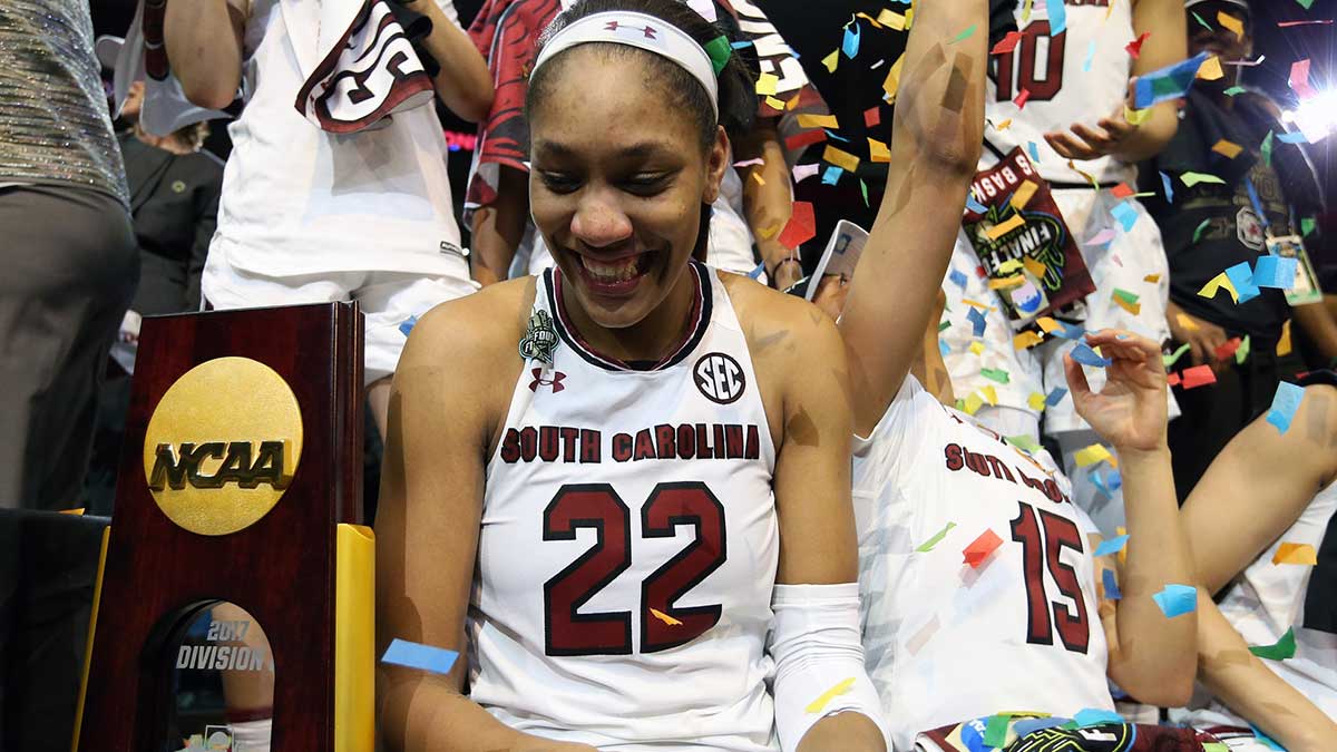 South Carolina Gamecocks forward A'ja Wilson (22) celebrates on the podium with the championship trophy after defeating the Mississippi State Lady Bulldogs in the 2017 Women's Final Four championship at American Airlines Center.