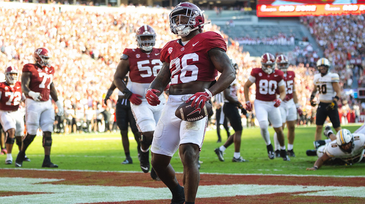Alabama Crimson Tide running back Jam Miller (26) scores a touchdown against the Missouri Tigers during the second quarter at Bryant-Denny Stadium.