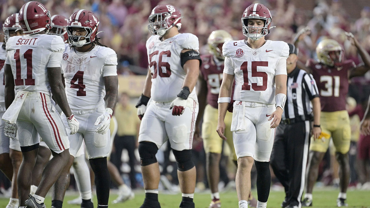 Alabama Crimson Tide quarterback Ty Simpson (15) reacts after a play against the Florida State Seminoles during the second half at Doak S. Campbell Stadium.