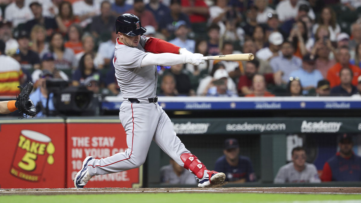 Aug 11, 2025; Houston, Texas, USA; Boston Red Sox third baseman Alex Bregman (2) hits a home run during the first inning against the Houston Astros at Daikin Park.