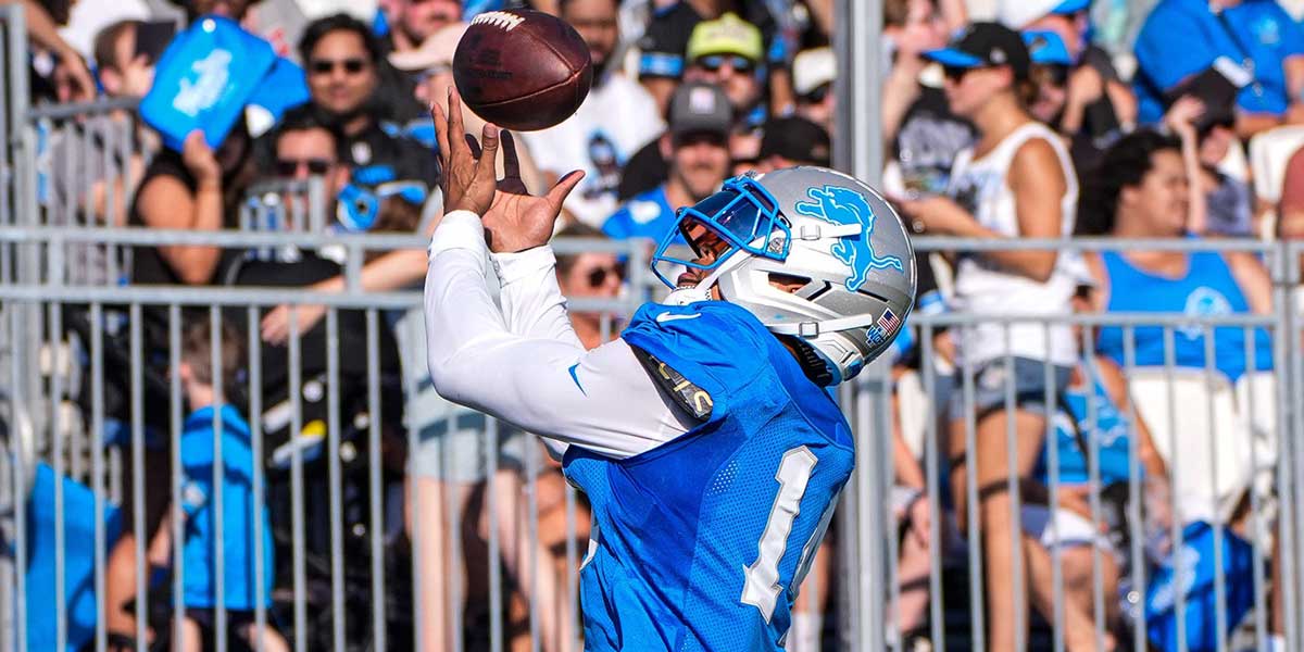 Detroit Lions wide receiver Amon-Ra St. Brown (14) practices during training camp