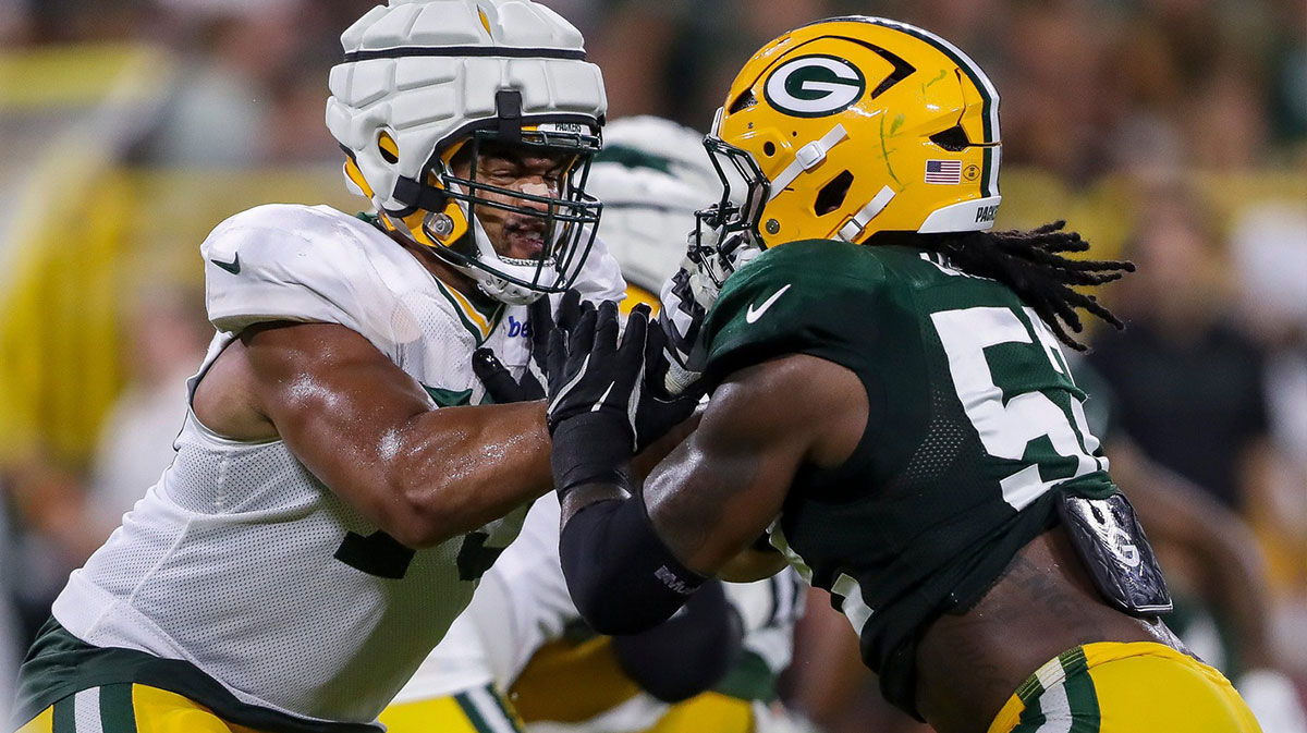 Green Bay Packers offensive lineman Andre Dillard (73) blocks defensive lineman Rashan Gary (52) during Family Night on Saturday, August 3, 2024, at Lambeau Field in Green Bay, Wis.