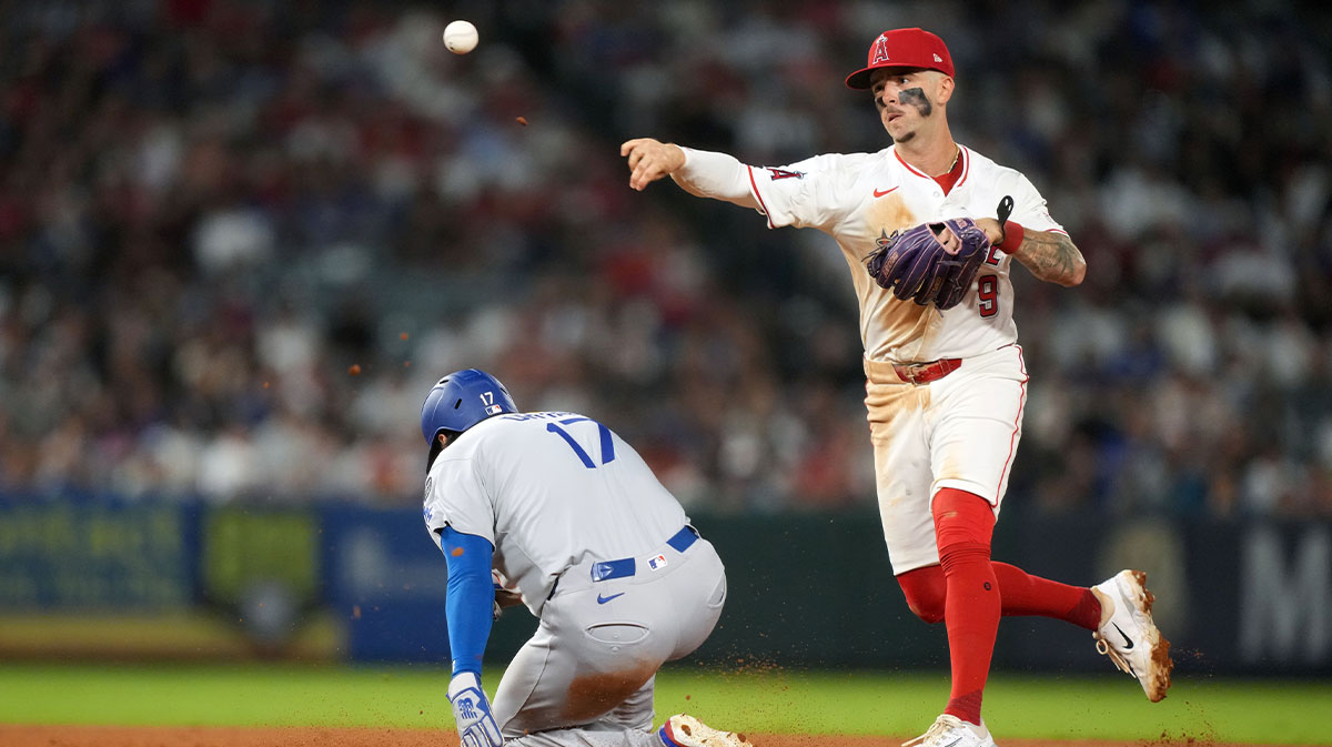 Los Angeles Angels shortstop Zach Neto (9) forces out Los Angeles Dodgers designated hitter Shohei Ohtani (17) out at second base in the fifth inning at Angel Stadium.