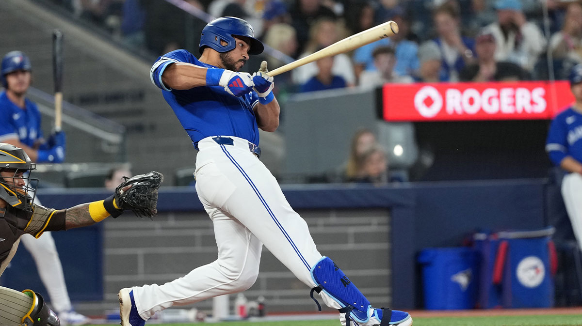 Toronto Blue Jays designated hitter Anthony Santander (25) hits a two-run home run against the San Diego Padres during the fifth inning at Rogers Centre