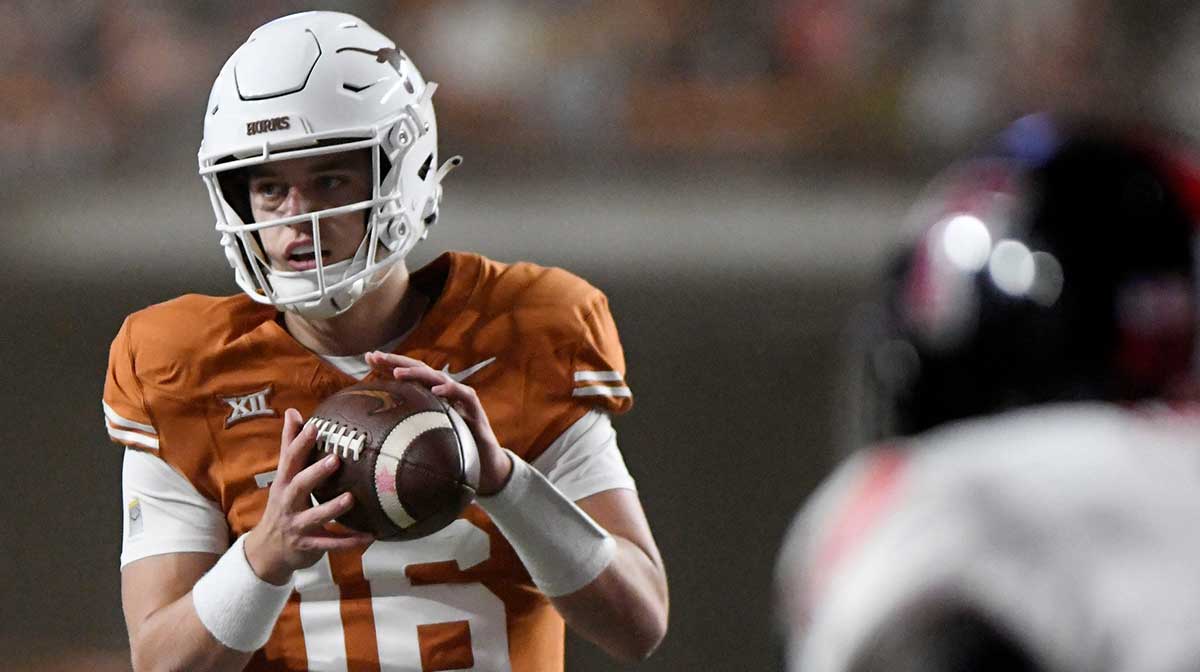 Texas' quarterback Arch Manning (16) catches the snap during the Big 12 football game against Texas Tech at Darrell K. Royal-Texas Memorial Stadium in Austin.