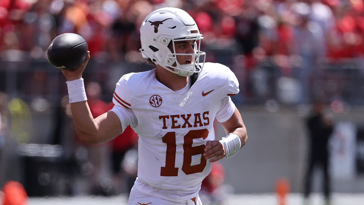 Texas Longhorns quarterback Arch Manning (16) drops back to pass against the Ohio State Buckeyes in the first half at Ohio Stadium.