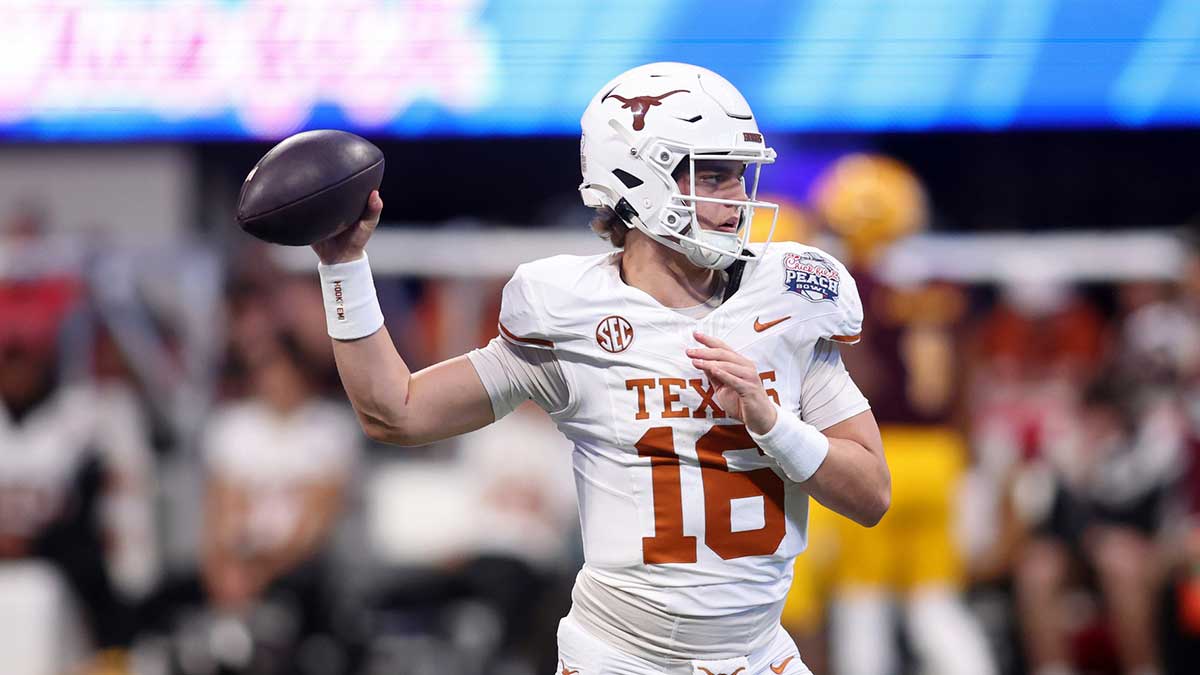 Texas Longhorns quarterback Arch Manning (16) warms up before the Peach Bowl at Mercedes-Benz Stadium.