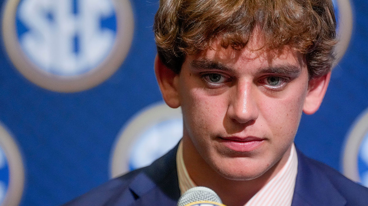 Texas quarterback Arch Manning listens to a question during SEC Media Days at the College Football Hall of Fame in Atlanta.