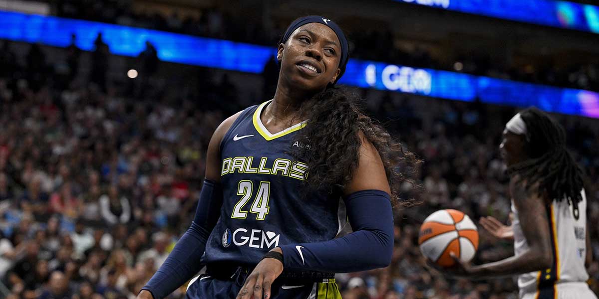 Dallas Wings guard Arike Ogunbowale (24) in action during the game between the Dallas Wings and the Indiana Fever at the American Airlines Center.