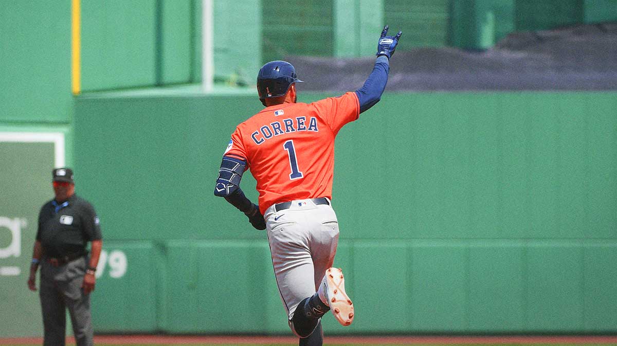 Houston Astros third baseman Carlos Correa (1) rounds the bases after hitting a home run during the fourth inning against the Boston Red Sox at Fenway Park.