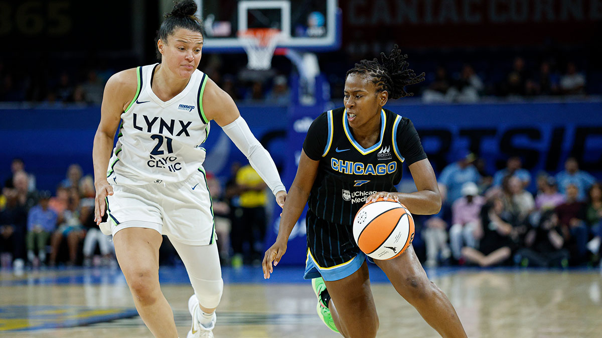 Chicago Sky guard Ariel Atkins (7) drives to the basket against Minnesota Lynx guard Kayla McBride (21) during the second half of a WNBA game at Wintrust Arena.