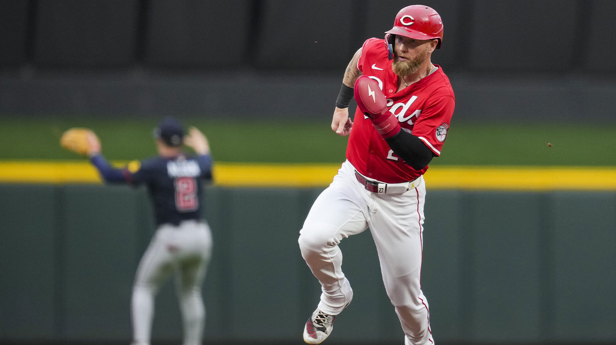 Cincinnati Reds outfielder Jake Fraley (27) scores a run on a double hit by catcher Tyler Stephenson in the game against the Atlanta Braves in the second inning at Great American Ball Park.
