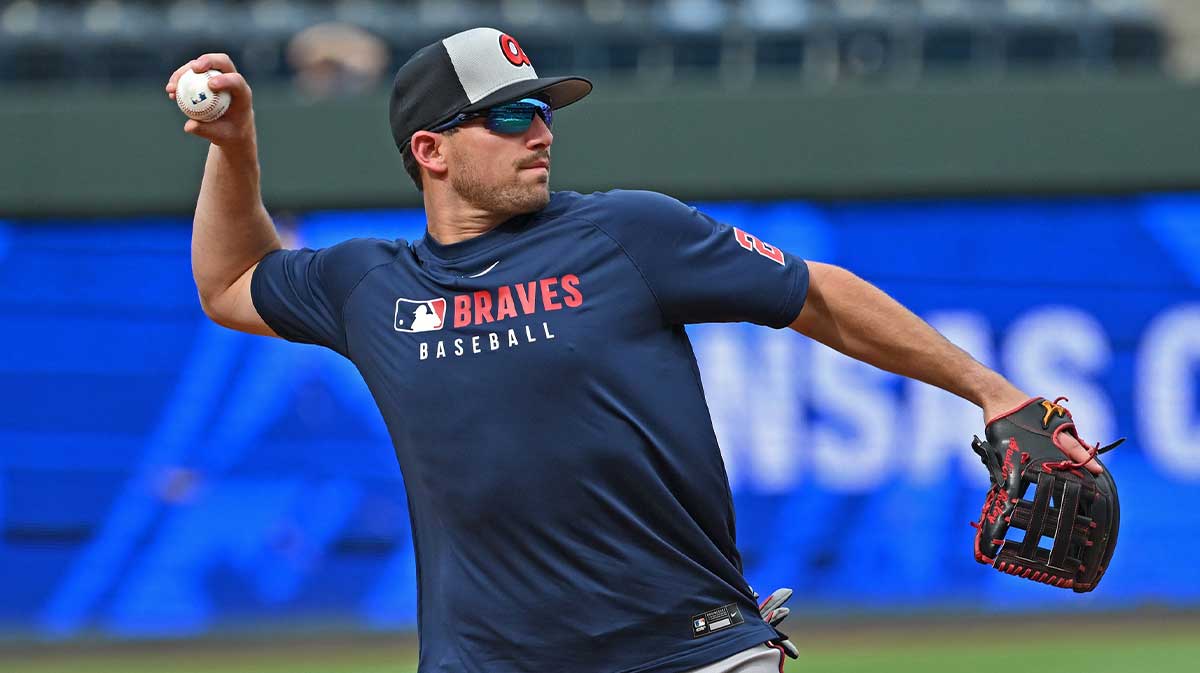 Atlanta Braves third baseman Austin Riley (27) takes fielding practice before a game against the Kansas City Royals at Kauffman Stadium.