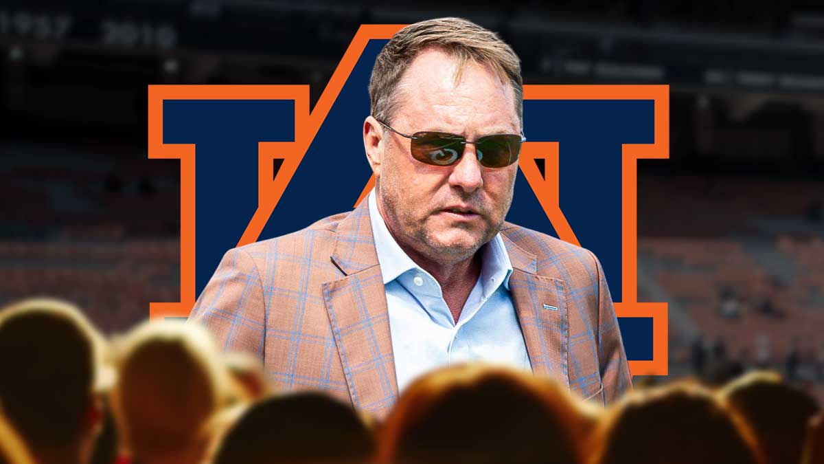 Hugh Freeze with Auburn logo and Jordan-Hare Stadium in the background.