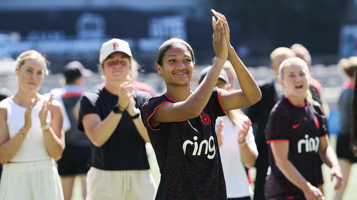 Portland Thorns FC forward Reilyn Turner (66) celebrates after a game against the Seattle Reign at Providence Park.