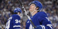 Toronto Maple Leafs forward Mitch Marner (16) looks up at the scoreboard as Toronto Maple Leafs forward Auston Matthews (34) skates to the bench during the third period of game seven of the second round of the 2025 Stanley Cup Playoffs against the Florida Panthers