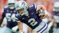 Kansas State quarterback Avery Johnson scores a touchdown during the Aer Lingus Classic between Iowa State and Kansas State at Aviva Stadium.