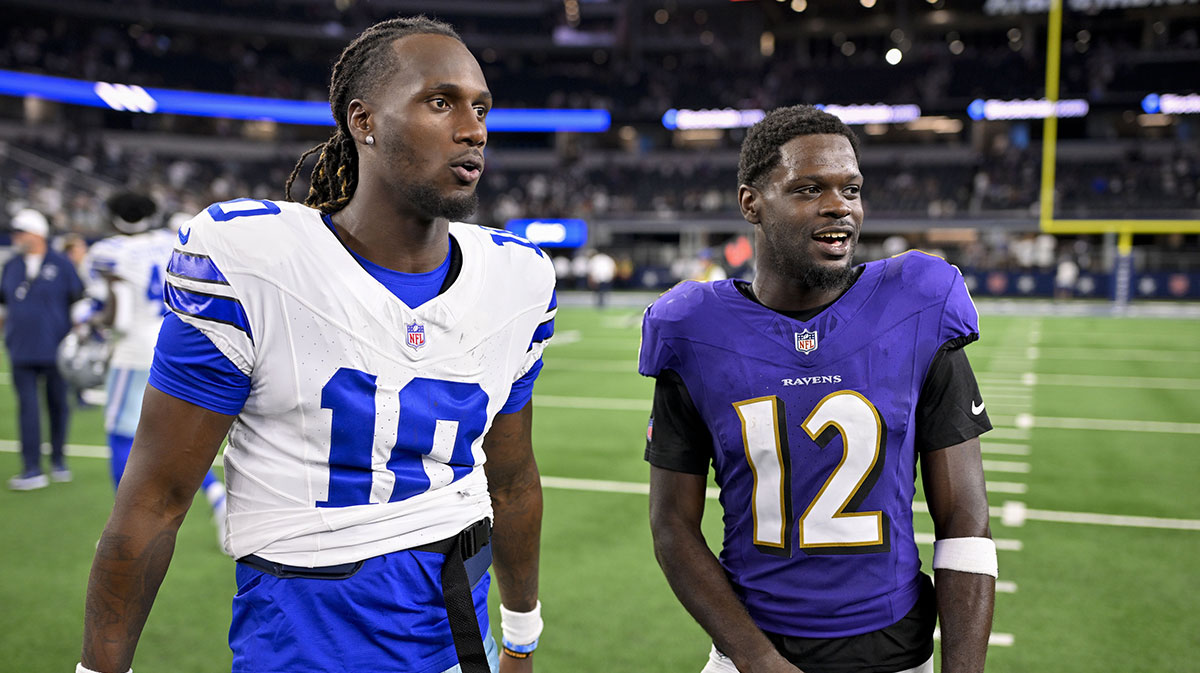 Dallas Cowboys quarterback Joe Milton III (10) talks with Baltimore Ravens wide receiver Malik Cunningham (12) after the game at AT&T Stadium.