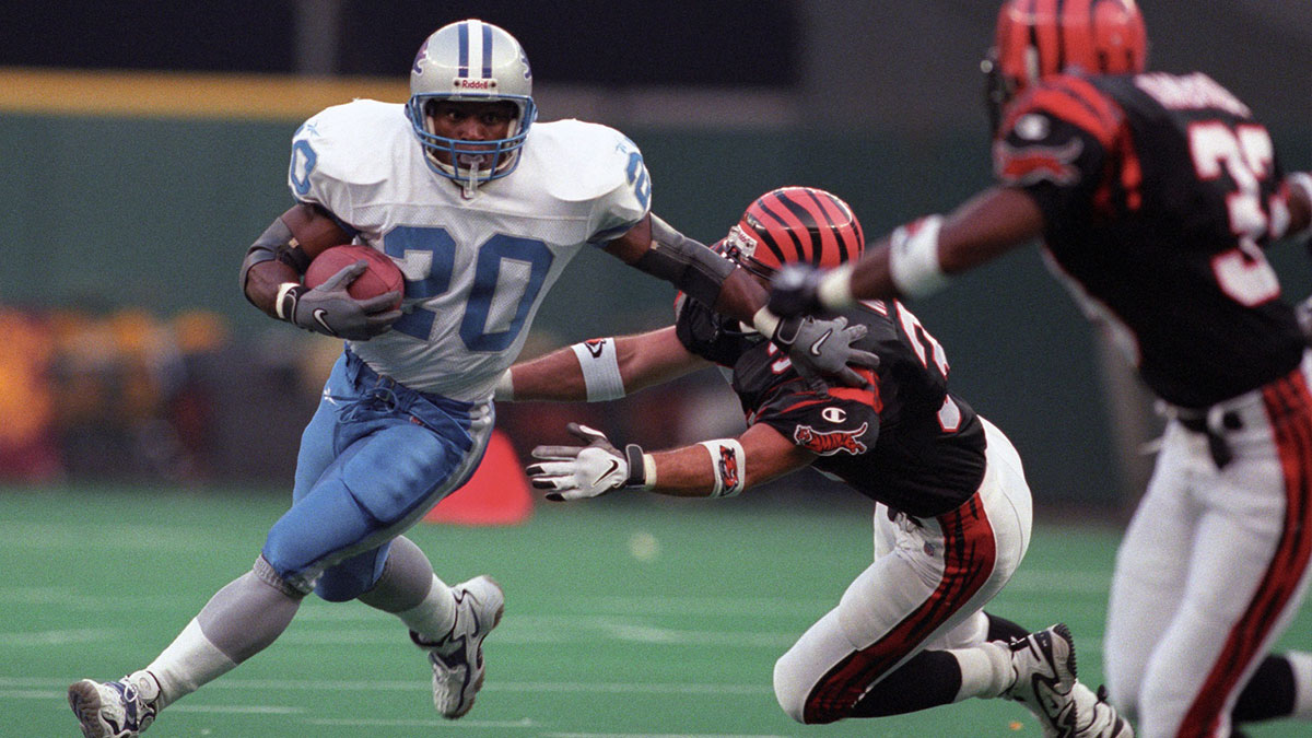 Sep 13, 1998; Cincinnati, OH, USA; FILE PHOTO; Detroit Lions running back Barry Sanders (20) runs with the ball against the Cincinnati Bengals at Riverfront Stadium. The Bengals defeated the Lions 34-28.