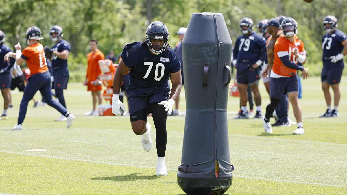 Chicago Bears offensive tackle Braxton Jones (70) runs during organized team activities at Halas Hall.