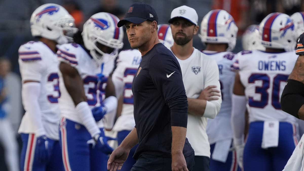 Bears head coach Ben Johnson on the field before a game against the Buffalo Bills at Soldier Field
