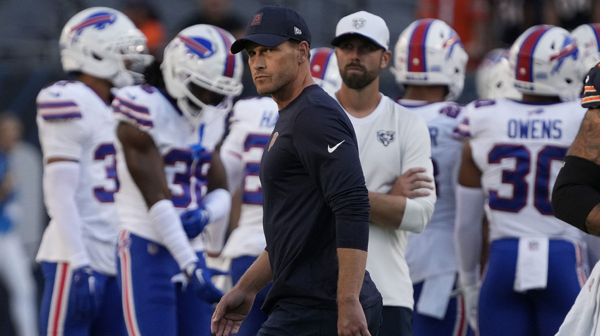 Chicago Bears head coach Ben Johnson on the field before a game against the Buffalo Bills at Soldier Field.