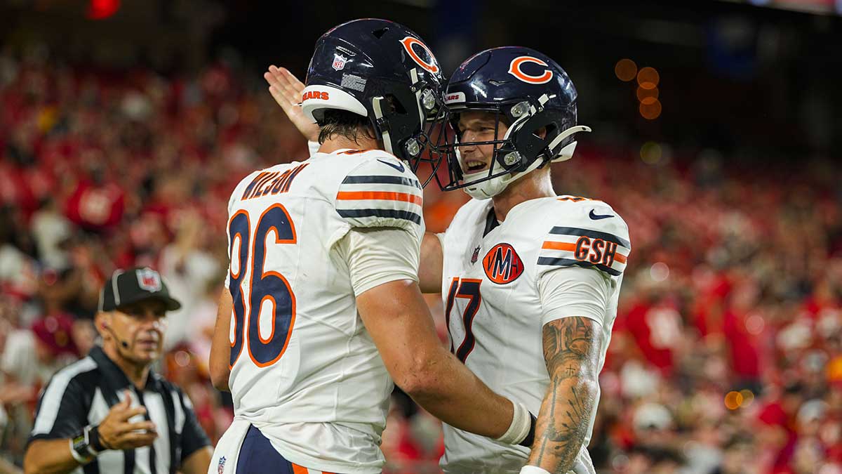 Bears tight end Joel Wilson (86) celebrates with quarterback Tyson Bagent (17) after scoring a touchdown during the second half against the Kansas City Chiefs at GEHA Field at Arrowhead Stadium
