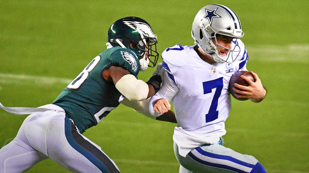 Dallas Cowboys quarterback Ben DiNucci (7) is pushed out of bounds by Philadelphia Eagles strong safety Will Parks (28) during the fourth quarter at Lincoln Financial Field.