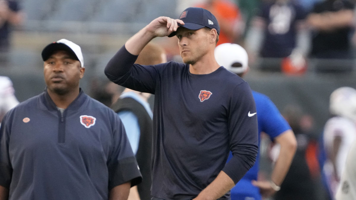 Chicago Bears head coach Ben Johnson on the field before a game against the Buffalo Bills at Soldier Field.