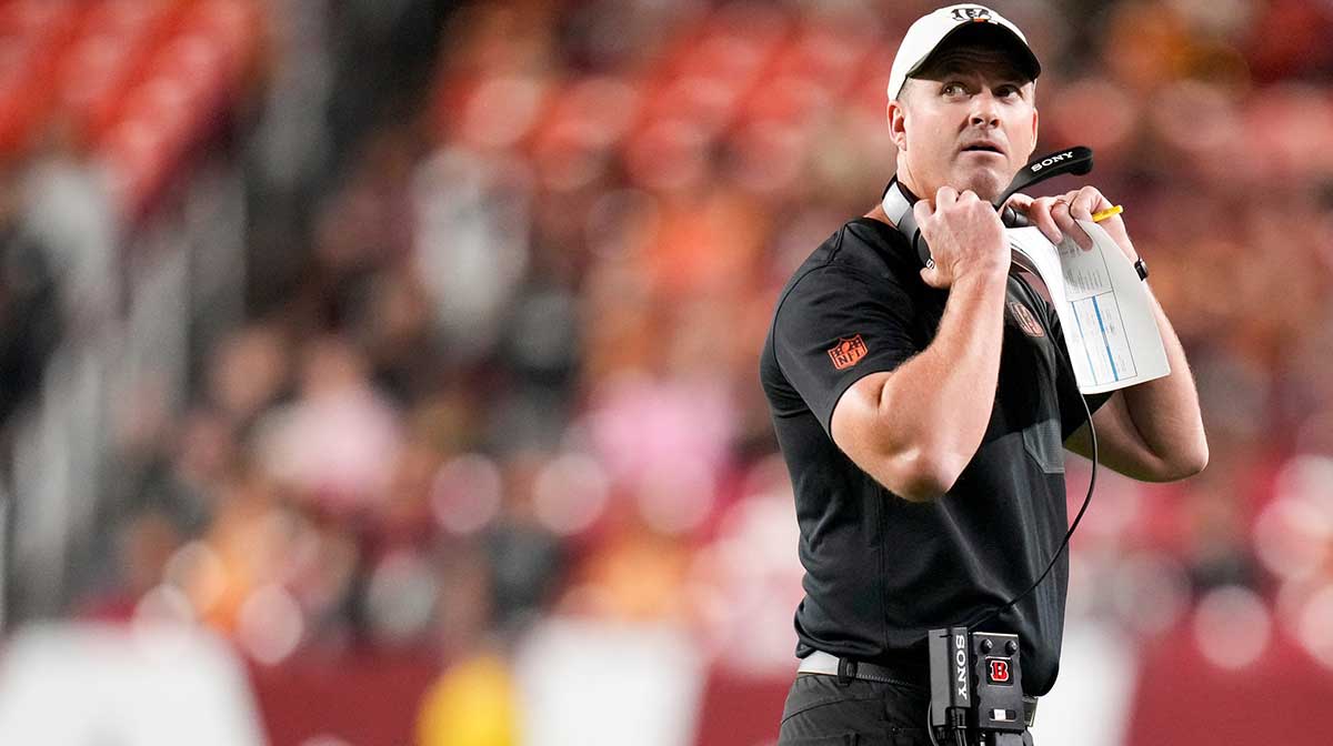 Bengals head coach Zac Taylor watches a replay on the video board in the first quarter of the NFL Preseason Week 2 game between the Washington Commanders