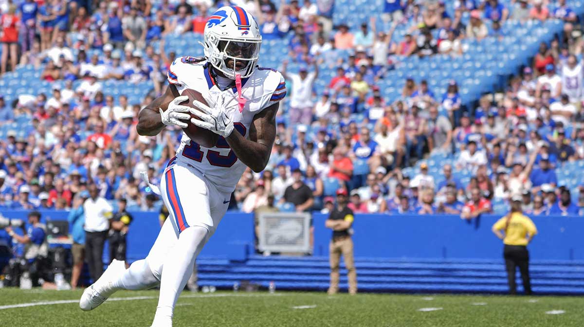 Aug 9, 2025; Orchard Park, New York, USA; Buffalo Bills wide receiver KJ Hamler (19) catches a pass for a touchdown against the New York Giants during the second half at Highmark Stadium. Mandatory Credit: Gregory Fisher-Imagn Images