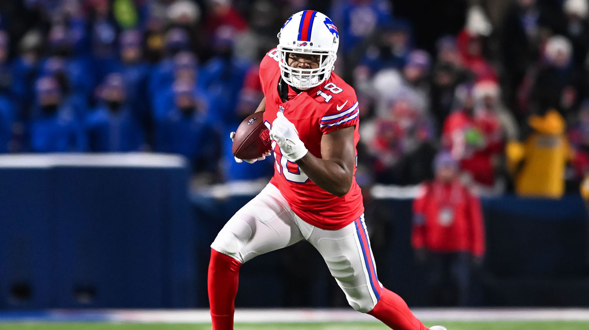 Bills wide receiver Amari Cooper (18) turns up field after making a catch in the second quarter against the New England Patriots at Highmark Stadium with Bills' Mike Whilte in the background