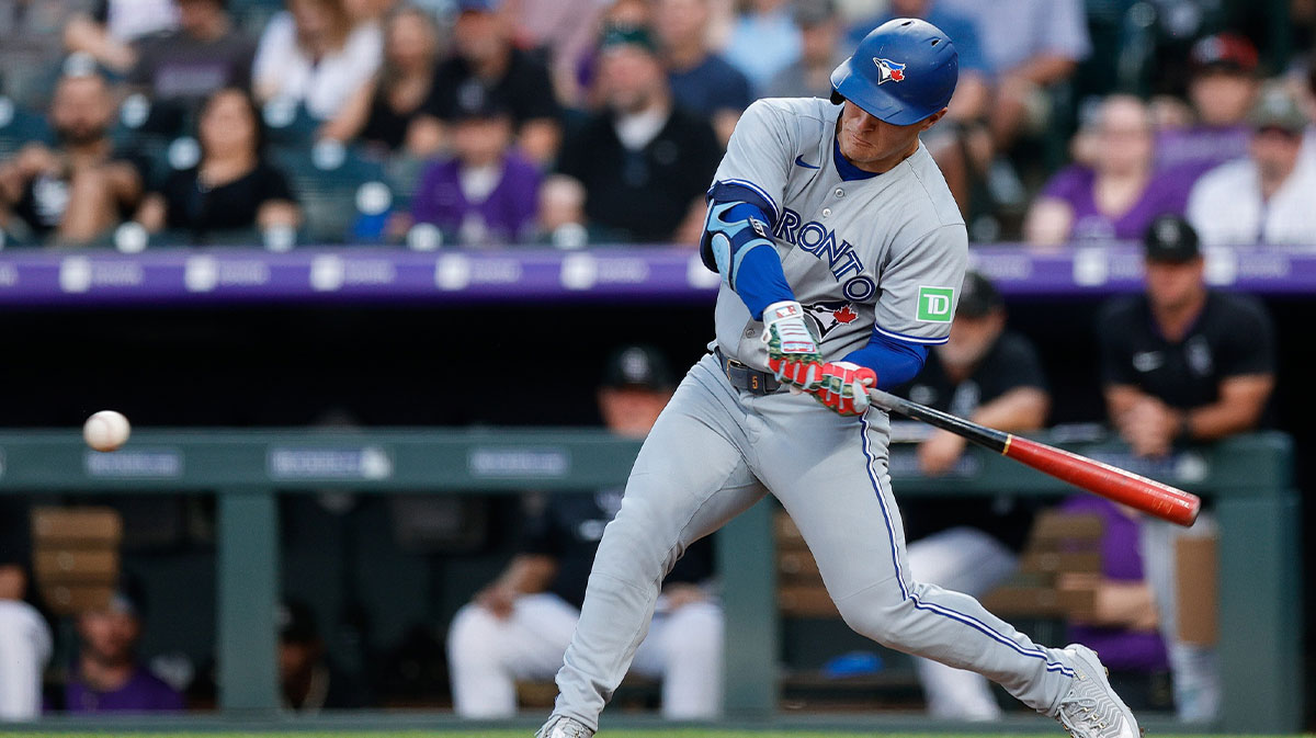 Blue Jays center fielder Daulton Varsho (5) hits a three run home run
