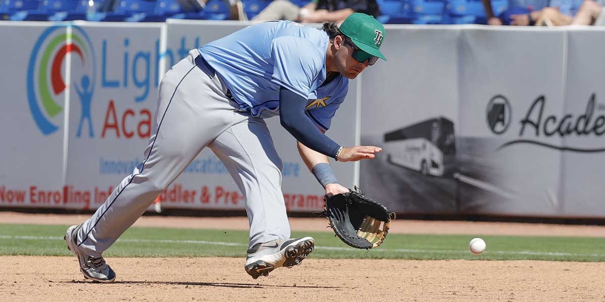 Tampa Bay Rays first baseman Bob Seymour fields a ground ball during the ninth inning against the New York Mets at Clover Park.