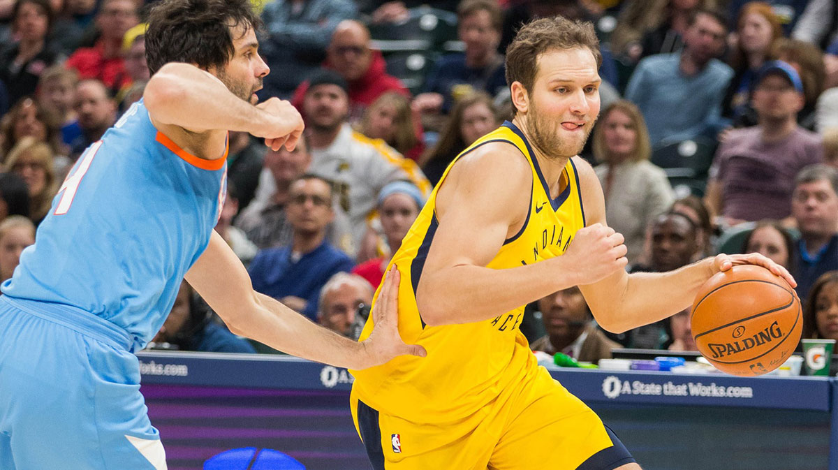 Indiana Pacers forward Bojan Bogdanovic (44) dribbles the ball while LA Clippers guard Milos Teodosic (4) defends in the second half at Bankers Life Fieldhouse.
