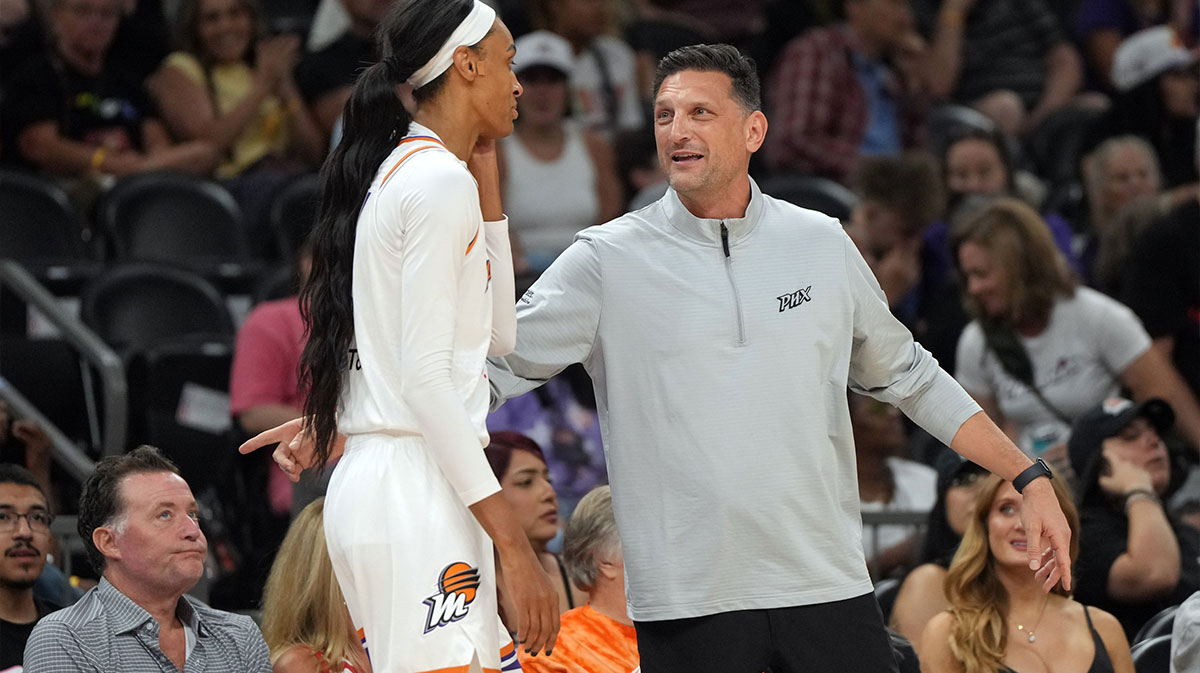 Phoenix Mercury head coach Nate Tibbitts talks to forward DeWanna Bonner (14) against the Connecticut Sun in the second half at Footprint Center.