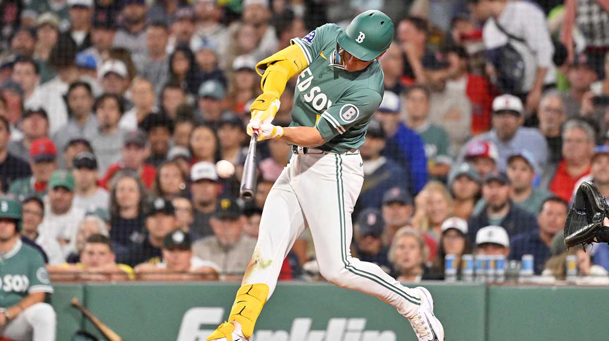 Boston Red Sox right fielder Roman Anthony (19) hits a home run against the Pittsburgh Pirates during the fifth inning at Fenway Park.