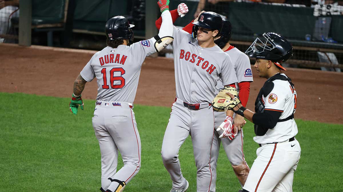 Boston Red Sox outfielder Jarren Duran (16) celebrates with his teammates after hitting a home run during the fifth inning against the Baltimore Orioles at Oriole Park at Camden Yards.