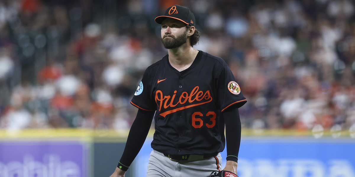 Baltimore Orioles starting pitcher Brandon Young (63) walks off the mound after pitching during the eighth inning against the Houston Astros at Daikin Park.