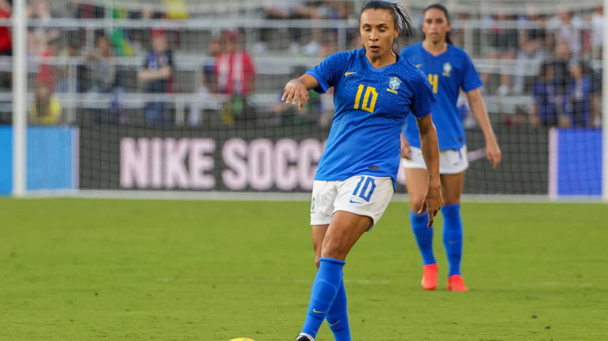Brazil forward Marta (10) kicks the ball during the second half against Japan at Exploria Stadium.
