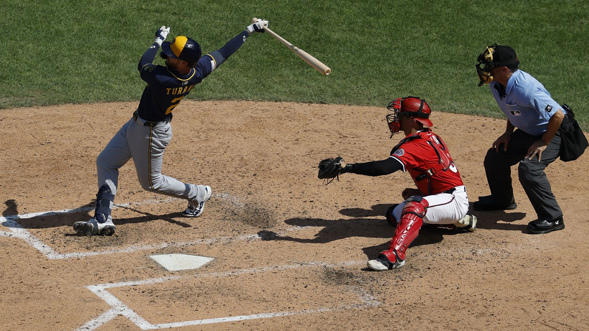 Milwaukee Brewers second baseman Brice Turang (2) hits a two run home run against the Washington Nationals during the seventh inning at Nationals Park.