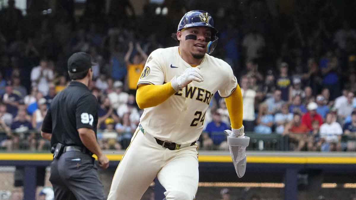 Milwaukee Brewers catcher William Contreras (24) scores from second base agasint the Pittsburgh Pirates in the fourth inning at American Family Field.