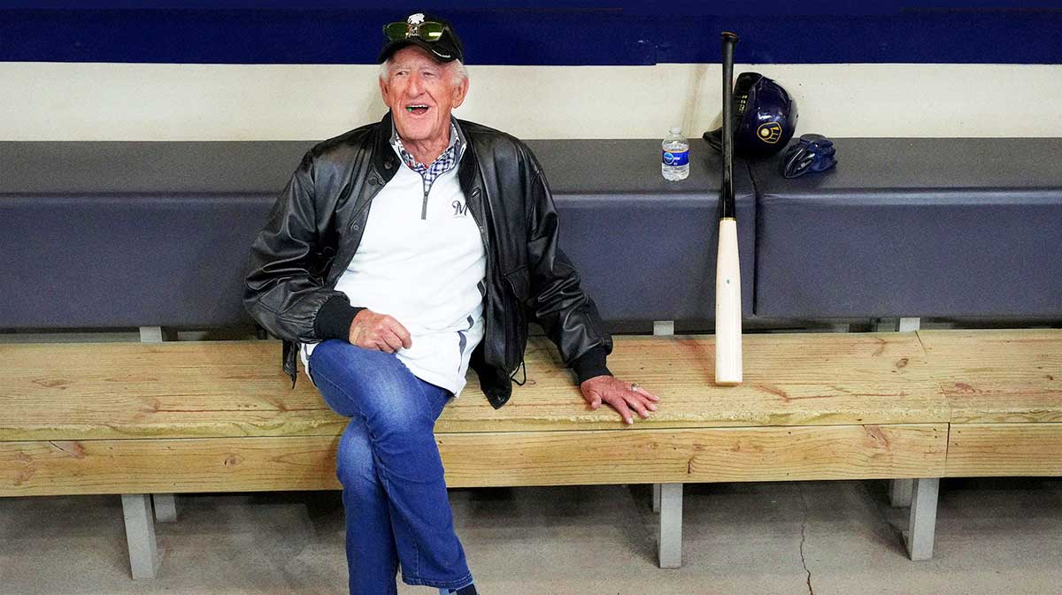 Bob Uecker sits in the Brewers dugoutat American Family Field in Milwaukee. Brewers honor Bob Uecker with touching pregame ceremony as the team joins his family on the mound before the Giants-Brewers game, despite a 4-3 loss.