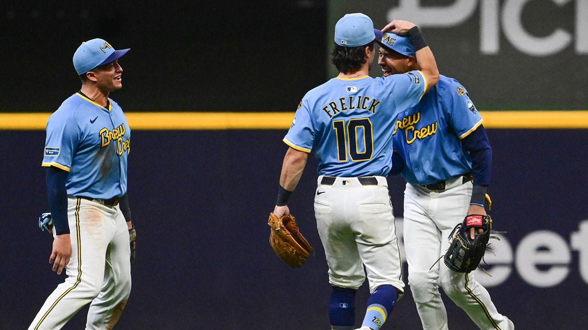 Milwaukee Brewers center fielder Blake Perkins (16) celebrates with right fielder Sal Frelick (10) after throwing out the potential tying run at the plate in the ninth inning at American Family Field.