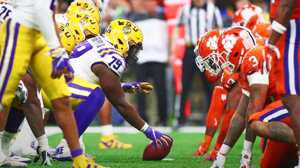 General view down the line of scrimmage as LSU Tigers center Lloyd Cushenberry III (79) prepares to snap the ball against the Clemson Tigers in the College Football Playoff national championship game at Mercedes-Benz Superdome.