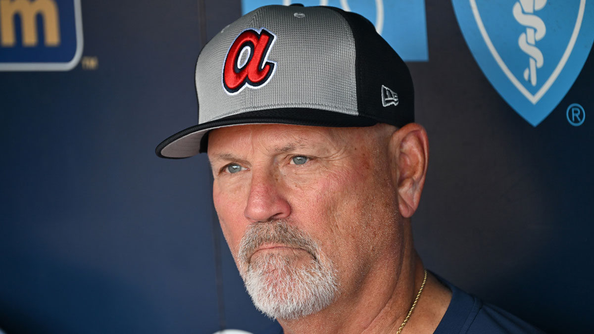 Atlanta Braves manager Brian Snitker (43) looks on during batting practice before a game against the Kansas City Royals at Kauffman Stadium.