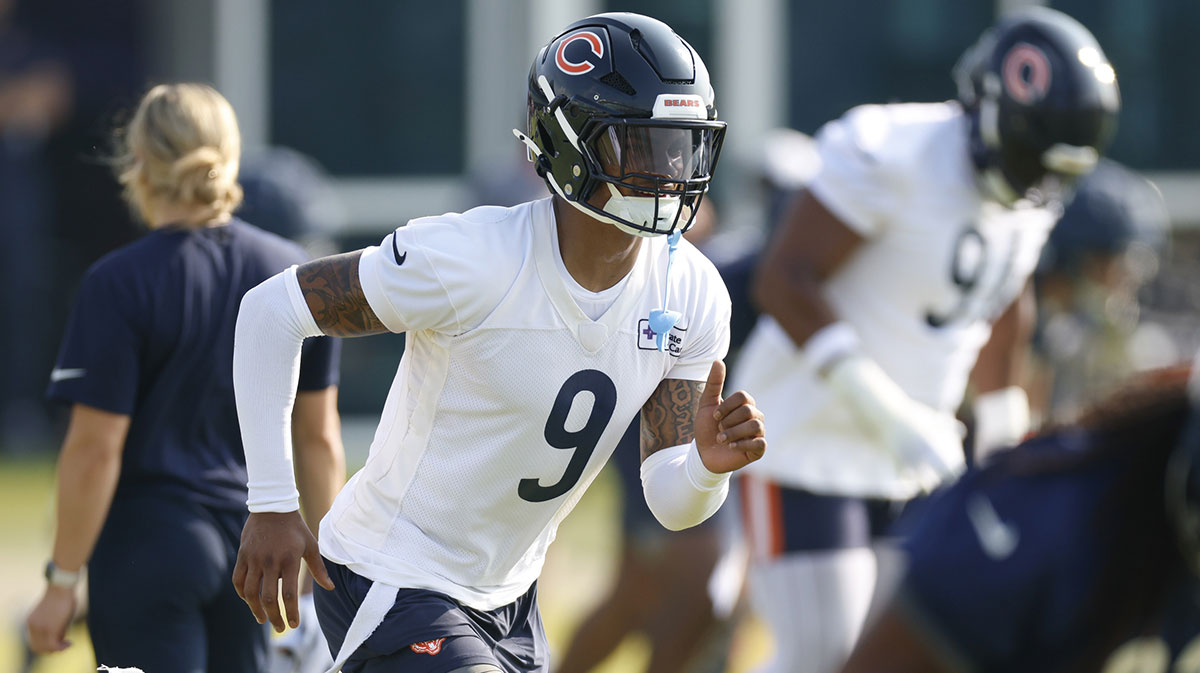 Chicago Bears safety Jaquan Brisker (9) runs during training camp at Halas Hall.