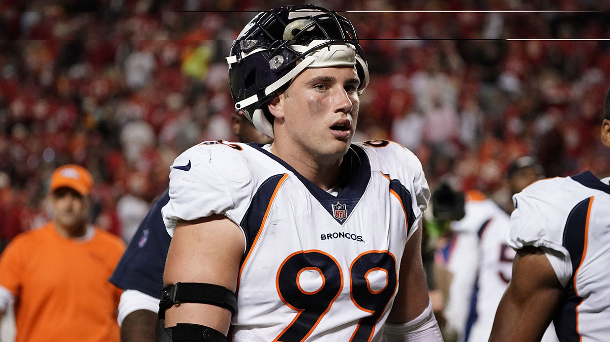 Denver Broncos defensive end Zach Allen (99) leaves the game against the Kansas City Chiefs at halftime at GEHA Field at Arrowhead Stadium.